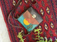 کیف دوشی زنانه تکه دوزی شده جنس چرم طبیعی نیل ست