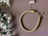 دستبند زنانه میوکی مدل اسپیرال طلایی
