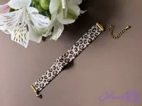 دستبند زنانه میوکی مدل پلنگی طلایی