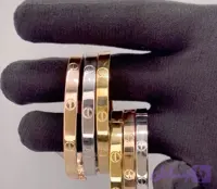 دستبند بنگل کارتیه استیل رنگ ثابت