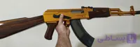 تفنگ AK47 کلاشینکف بزرگ نیمه فلزی طلایی مطابق اندازه واقعی 1.1 تیر ژله ای کیفیت عالی مدل اصلی رگباری دارای موتور در خشاب باتری باظرفیت بالا تک تیر و رگباری به صورت برقی برای شلیک بسیار دقیق