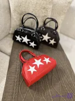 کیف زنانه استار ۹۹ مدل هلالی – Star 99 Bag