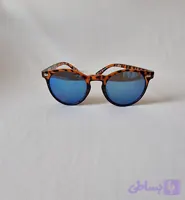 عینک آفتابی بچگانه وارداتی، فریم طرح پلنگی و لنز آینه‌ای آبی