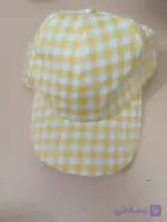 کلاه کپ زرد چهارخونه