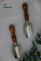 قاشق ادویه دسته چوبی رنگ نقره ای