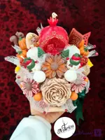 باکس گل شمع یلدا | هدیه‌ای از قصه‌های گرم زمستان