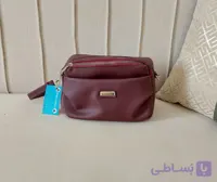 کیف دخترانه جنس چرم‌مصنوعی رنگ زرشکی