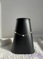 پابند استیل طلایی مرواریدی