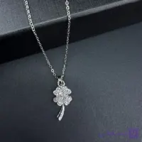 پلاک گل نقره ای ژوپینگ