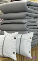 کاور تشک زیپدار(روتشکی) به همراه ۲عددروبالشی دکمه دار