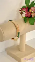 ✨ دستبند النگویی میناکاری شده تم طلایی و سبز رنگ 💚💛 دارای درجه کیفی بسیار بالا، جنس محصول از استیل طلایی براق و هنر مینا کاری ایرانی ✨💚💛 این دستبند قفلی می باشد و مناسب سایز دور مچ 15.5 تا 17 سانتی متر هست. 😊✨💚💛
