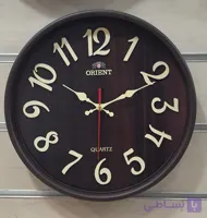ساعت دیواری اورینت قهوه‌ای طرح چوب 32 سانتیمتری آرامگرد