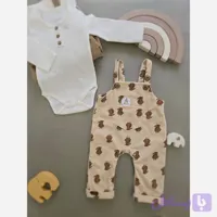 ست پیراهن شلوار پیشبندی زیردکمه بادی بیسکوئیتی نوزاد در 3 رنگ و 4 سایز