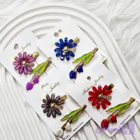 گیره مو وارداتی طرح بابونه و لاله بسته 2 عددی