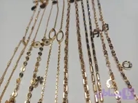 پابند ژوپینگ طرح طلا (کد PLUZX)