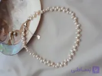 ست لوکس مروارید پرورشی درجه یک (A+) با اتصالات نقره خالص؛ گردنبند، دستبند و گوشواره