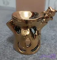 اسانس سوز طلایی رنگ ثابت