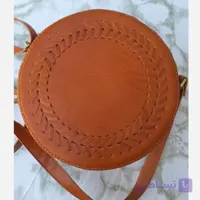 کیف چرم طبیعی مدل گرد یا دایره ای