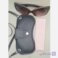 جاعینکی گردنی چرم طبیعی مدل جیب دکمه دار برای دستمال عینک