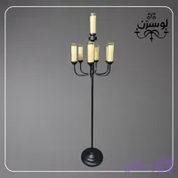 آباژور کنار سالنی ایستاده 7 شعله مدل L