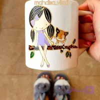 لیوان دخترک و گربه